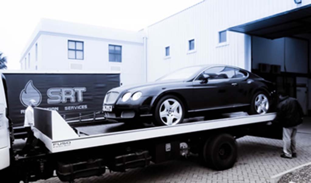 Image of a car being brought to SRT for restoration services, showcasing expertise in automotive restoration.