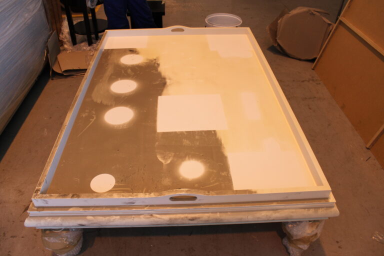 Before photo of a damaged coffee table in need of refurbishment