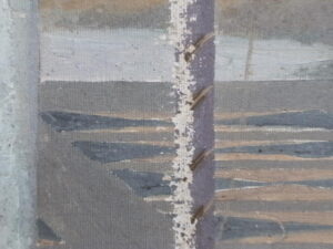 Close-up image capturing the intricate details of a damaged painting in need of restoration.